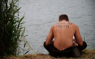 Re-enactor with the rune tattoo  ‘warrior of truth’ at the Slavic and Viking Festival in Wolin 2017. Photo: Jakub T. Jankiewicz, © Wikimedia Commons
